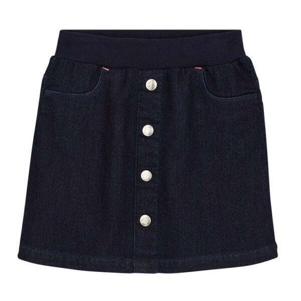 Jupe en denim bleu avec boutons en argent.
